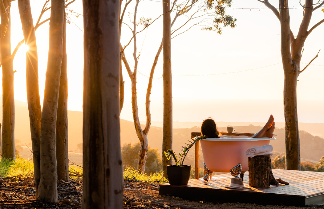 There's no better way to soak up the views of the natural surrounds than from an outdoor bathtub positioned amongst the limber trees of the hillside. 
